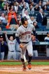 Houston Astros' Josh Reddick watches his home run against the New York Yankees during the first inning in Game 3 of baseball's American League Championship Series Tuesday, Oct. 15, 2019, in New York. (AP Photo/Matt Slocum)
