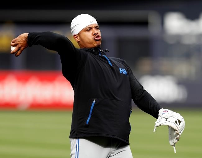 Toronto Blue Jays starting pitcher Marcus Stroman throws as he takes ground balls before a baseball game against the New York Yankees, Monday, June 24, 2019, in New York. Stroman realizes he may soon be traded, and he would not mind closing out the year in pinstripes. The right-hander is from Long Island and says he loves pitching at Yankee Stadium, calling New York the