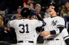 New York Yankees center fielder Aaron Hicks (31) celebrates with Aaron Judge after hitting a three-run home run against the Houston Astros during the first inning of Game 5 of baseball's American League Championship Series, Friday, Oct. 18, 2019, in New York. (AP Photo/Frank Franklin II)