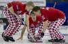 Jonathan Hayward / The Canadian Press
Norway skip Thomas  Ulsrud, centre, makes a shot with lead Havard Vad Petersson and second Christoffer Svae during a draw against team U.S.A. at the Brandt Centre during the Ford World Mens Curling Championships in Regina, Sask., Tuesday.  Norway has surprised with six sudden-death victories so far.