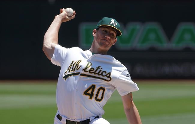 Oakland Athletics pitcher Chris Bassitt (40) throws to a Baltimore Orioles batter during the first inning of a baseball game in Oakland, Calif., Wednesday, June 19, 2019. (AP Photo/Jeff Chiu)