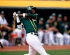 Oakland Athletics' Jurickson Profar watches his solo home run against the San Francisco Giants during the fourth inning of an exhibition baseball game Sunday, March 24, 2019, in Oakland, Calif. (AP Photo/D. Ross Cameron)