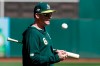 Oakland Athletics manager Bob Melvin watches baseball practice in Oakland, Calif., Tuesday, Oct. 1, 2019. The Athletics are scheduled to face the Tampa Bay Rays in an American League wild-card game Wednesday, Oct. 2. (AP Photo/Jeff Chiu)