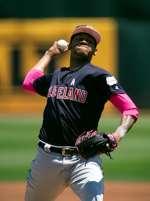 CORRECTS TO 2019 NOT 2018 - Cleveland Indians starting pitcher Jefry Rodriguez delivers against the Oakland Athletics during the first inning of a baseball game, Sunday, May 12, 2019, in Oakland, Calif. (AP Photo/D. Ross Cameron)