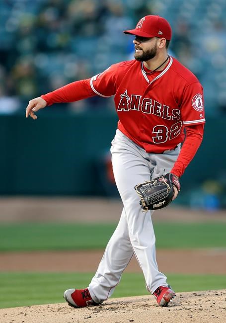Los Angeles Angels pitcher Cam Bedrosian works against the Oakland Athletics in the first inning of a baseball game Tuesday, May 28, 2019, in Oakland, Calif. (AP Photo/Ben Margot)