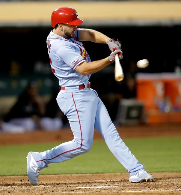 St. Louis Cardinals' Paul DeJong connects for an RBI-single against the Oakland Athletics in the sixth inning of a baseball game Saturday, Aug. 3, 2019, in Oakland, Calif. (AP Photo/Ben Margot)