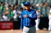 Kansas City Royals manager Ned Yost walks to the dugout after making a pitching change during the ninth inning of a baseball game between the Oakland Athletics and the Royals in Oakland, Calif., Wednesday, Sept. 18, 2019. (AP Photo/Jeff Chiu)