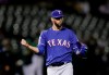 Texas Rangers pitcher Chris Martin celebrates the 5-2 win as the final out is made against the Oakland Athletics in the ninth inning of a baseball game Friday, July 26, 2019, in Oakland, Calif. (AP Photo/Ben Margot)
