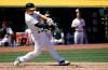 Oakland Athletics' Matt Chapman hits a solo home run against the Texas Rangers during the fifth inning of a baseball game in Oakland, Calif., Wednesday, April 24, 2019. (AP Photo/Jeff Chiu)