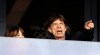 Musician Mick Jagger watches an evening session of athletics in the Olympic Stadium at the 2012 Summer Olympics, London, Monday, Aug. 6, 2012. (AP Photo/Matt Slocum)