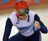 Britain's Philip Hindes celebrates after winning the gold medal in the men's team spring track cycling event in the velodrome during the 2012 Summer Olympics, Thursday, Aug. 2, 2012, in London. (AP Photo/Matt Rourke)
