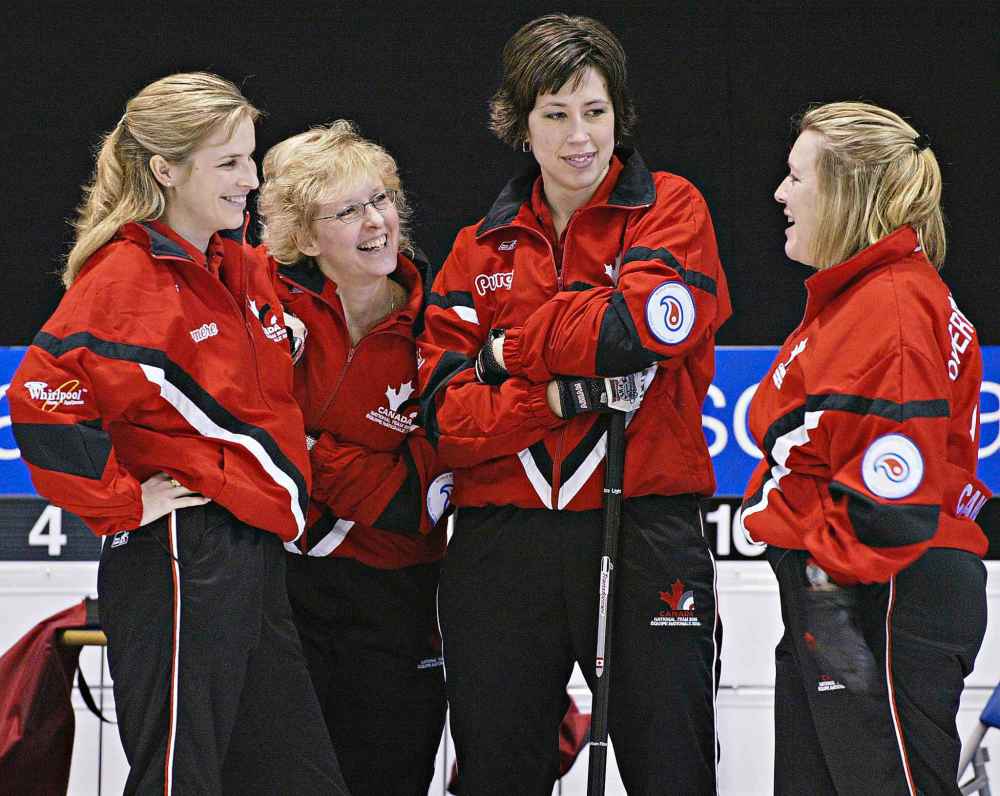 (CP PHOTO/Andrew Vaughan)
Skip Jennifer Jones, lead Cathy Gauthier, second Jill Officer and third Cathy Overton-Clapham, left to right, in their new Team Canada uniforms at the World Women's Curling Championship in Scotland, 2005.