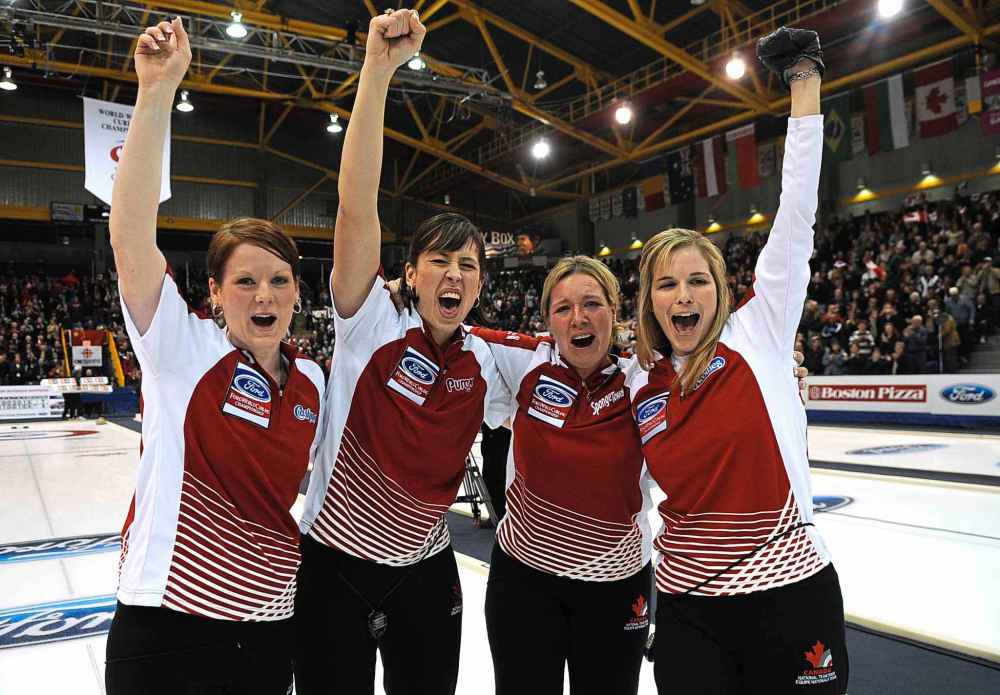 Michael Burns photo
Team Canada's Dawn Askin, Jill Officer, Cathy Overton Clapham and skip Jennifer Jones of Winnipeg, celebrate after defeating China 7-4 to capture the World championships in 2008.