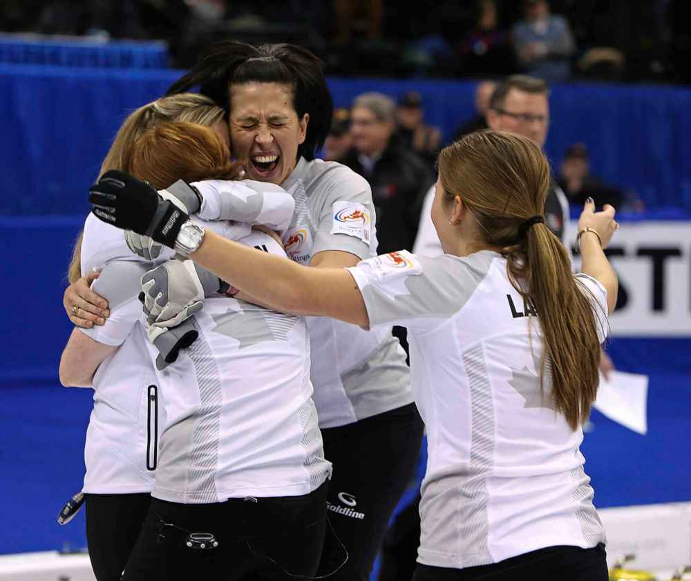 Jason Halstead / Winnipeg Free Press
Jennifer Jones, Dawn McEwen, Jill Officer and Kaitlyn Lawes celebrate after winning in the finals of Roar of the Rings curling at the MTS Centre in 2013 to win the right to represent Canada at the Winter Olympics in Sochi, Russia.