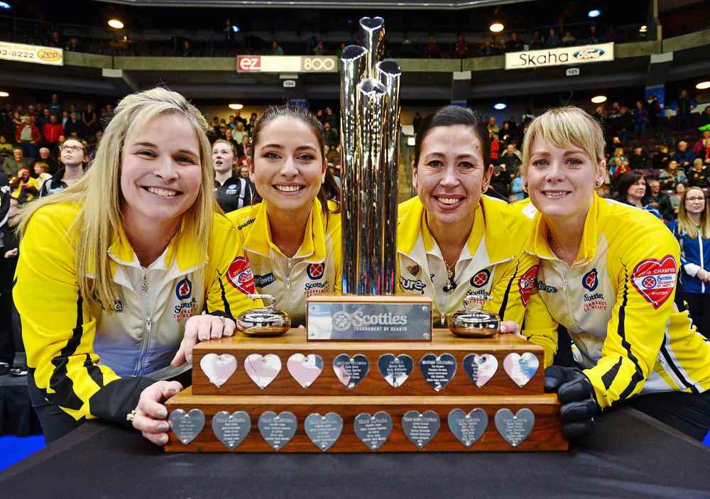 THE CANADIAN PRESS/Sean Kilpatrick
Left to right, Jennifer Jones, Shannon Birchard, Jill Officer and Dawn McEwen pose with the trophy after winnipeg the Scotties Tournament of Hearts in Penticton, B.C., on Sunday, Feb. 4, 2018.