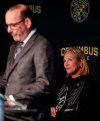 Dee Haslam, right, a member of the ownership group for Columbus Crew SC, listens as MLS commissioner Don Garber speaks during a Columbus Crew SC introductory press conference in Columbus, Ohio, Wednesday, Jan. 9, 2018. (Joshua A. Bickel/The Columbus Dispatch via AP)