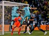 Columbus Crew defender Jonathan Mensah (4) and midfielder Artur (8) are unable to score against Portland Timbers goalkeeper Jeff Attinella (1) and defender Larrys Mabiala (33) in the first half of an MLS soccer game in Columbus, Ohio, Saturday, April 20, 2019. (Eric Albrecht/The Columbus Dispatch via AP)