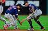 Minnesota Twins' Byron Buxton, right, and Jorge Polanco celebrate after defeating the Cleveland Indians in a baseball game, Friday, July 12, 2019, in Cleveland. (AP Photo/David Dermer)