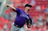 Colorado Rockies starting pitcher Chi Chi Gonzalez throws against the Cincinnati Reds during the first inning of a baseball game, Saturday, July 27, 2019, in Cincinnati. (AP Photo/Gary Landers)