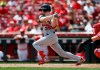 St. Louis Cardinals' Lane Thomas (35) hits an RBI single off Cincinnati Reds starting pitcher Alex Wood during the fourth inning of a baseball game, Sunday, Aug. 18, 2019, in Cincinnati. (AP Photo/Gary Landers)