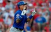 Chicago Cubs' Javier Baez reacts after hitting a grand slam off Cincinnati Reds relief pitcher Jared Hughes during the eighth inning of a baseball game, Saturday, June 29, 2019, in Cincinnati. (AP Photo/Gary Landers)