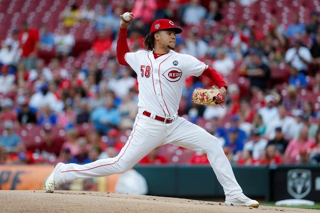 Cincinnati Reds starting pitcher Luis Castillo throws during the first inning of the team's baseball game against the Chicago Cubs, Thursday, May 16, 2019, in Cincinnati. (AP Photo/John Minchillo)