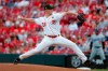 Cincinnati Reds starting pitcher Anthony DeSclafani throws in the first inning of a baseball game against the Los Angeles Dodgers, Friday, May 17, 2019, in Cincinnati. (AP Photo/John Minchillo)