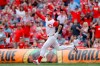 Cincinnati Reds' Michael Lorenzen runs the bases after hitting a game-winning RBI double off Arizona Diamondbacks relief pitcher T.J. McFarland in the ninth inning of a baseball game, Sunday, Sept. 8, 2019, in Cincinnati. (AP Photo/John Minchillo)