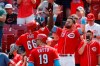 Cincinnati Reds' Yasiel Puig (66) celebrates with Jesse Winker (33) after hitting a two-run home run off Texas Rangers relief pitcher Peter Fairbanks in the fourth inning of a baseball game, Sunday, June 16, 2019, in Cincinnati. (AP Photo/John Minchillo)