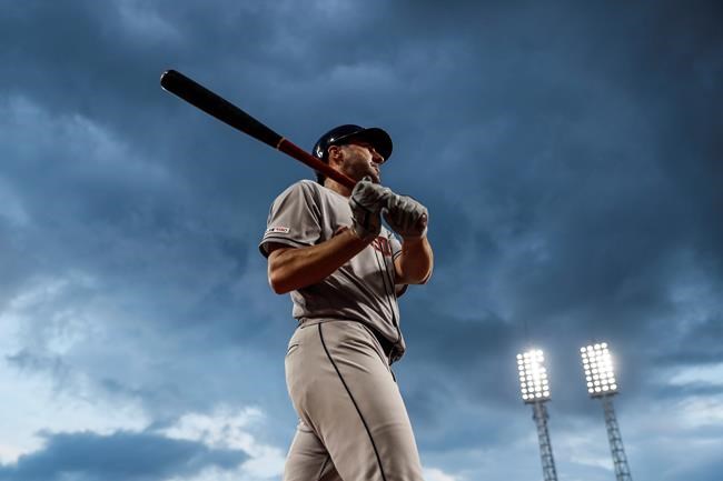 Houston Astros' Justin Verlander steps up to bat during the sixth inning of the team's baseball game against the Cincinnati Reds, Tuesday, June 18, 2019, in Cincinnati. (AP Photo/John Minchillo)