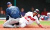 Tampa Bay Rays relief pitcher Oliver Drake (47) tags out Cleveland Indians' Leonys Martin, right, at home plate during the seventh inning of a baseball game, Sunday, May 26, 2019, in Cleveland. (AP Photo/Ron Schwane)
