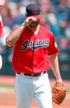 Cleveland Indians starting pitcher Cody Anderson walks back to the dugout after being pulled during the first inning of a baseball game against the Seattle Mariners, Sunday, May 5, 2019, in Cleveland. (AP Photo/Ron Schwane)