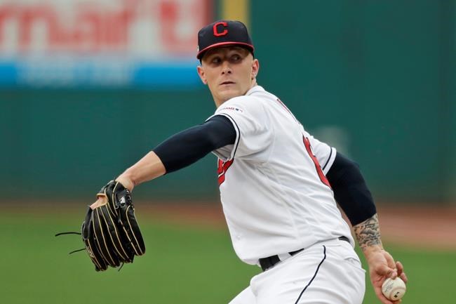Cleveland Indians starting pitcher Zach Plesac delivers in the first inning of a baseball game against the Boston Red Sox, Monday, Aug. 12, 2019, in Cleveland. (AP Photo/Tony Dejak)
