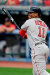 Boston Red Sox's Rafael Devers watches his RBI double during the first inning of the team's baseball game against the Cleveland Indians, Tuesday, Aug. 13, 2019, in Cleveland. (AP Photo/Tony Dejak)