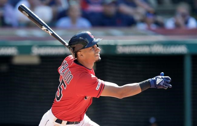 Cleveland Indians' Oscar Mercado watches his ball after hitting an RBI-single in the third inning in a baseball game against the Detroit Tigers, Saturday, June 22, 2019, in Cleveland. Mike Freeman scored on the play. (AP Photo/Tony Dejak)