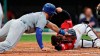 Kansas City Royals' Alex Gordon is tagged out by Cleveland Indians catcher Roberto Perez at home plate in the third inning of a baseball game, Friday, July 19, 2019, in Cleveland. (AP Photo/Tony Dejak)