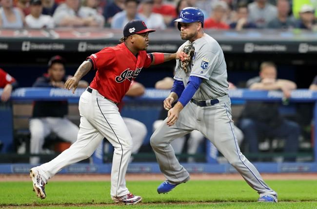 Kansas City Royals' Lucas Duda, right, is tagged out by Cleveland Indians' Jose Ramirez in a rundown at home in the sixth inning in a baseball game, Tuesday, June 25, 2019, in Cleveland. (AP Photo/Tony Dejak)