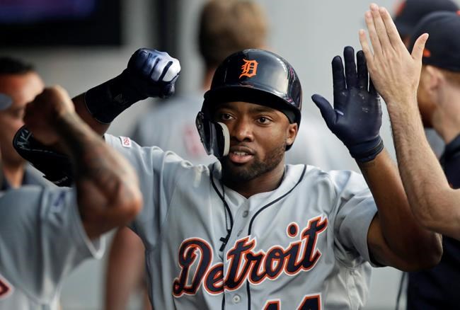 Detroit Tigers' Christin Stewart is congratulated by teammates after hitting a home run in the fifth inning of the team's baseball game against the Cleveland Indians, Friday, June 21, 2019, in Cleveland. (AP Photo/Tony Dejak)