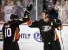Jae C. Hong / The Associated Press Files
Anaheim Ducks' Corey Perry, left, and Ryan Getzlaf celebrate the team's 5-1 win over the Edmonton Oilers on April 1 in Anaheim, Calif.