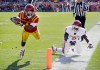 Charlie Neibergall / The Associated Press files
Iowa State wide receiver Jarvis West, left, dives to the end zone ahead of Oklahoma defensive back Gabe Lynn, right, during a 19-yard touchdown run during an NCAA college football game in November 2012. Lynn has now been signed to play for the Winnipeg Blue Bombers.