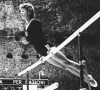 FILE - In this Sept. 8, 1960 file photo, Larisa Latynina of the Soviet Union competes at the 1960 Summer Olympics in Rome. She won the gold medal in the woman's individual gymnastics event. The gymnast whose career record for most Olympic medals was broken by Michael Phelps says she doesn't mind that the American swimmer has surpassed her mark. Latynina, who won 18 medals in the 1956, 1960 and 1964 Olympics, was at the Aquatics Centre in London on Tuesday to watch Phelps, and she says she was happy for him. (AP Photo)