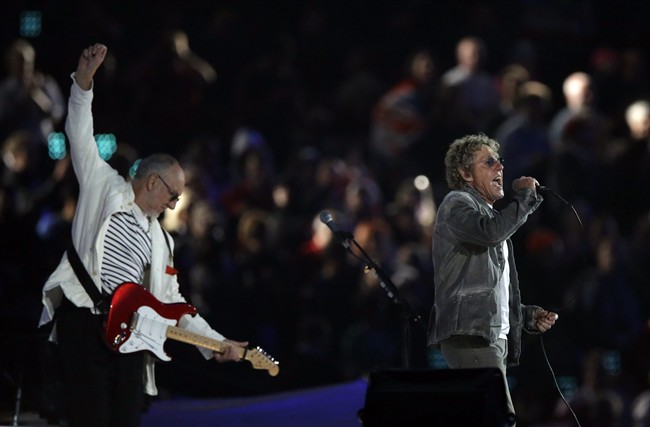 The Who guitarist Pete Townsend, left, and singer Roger Daltrey perform during the Closing Ceremony at the 2012 Summer Olympics, Monday, Aug. 13, 2012, in London. (AP Photo/Matt Slocum)