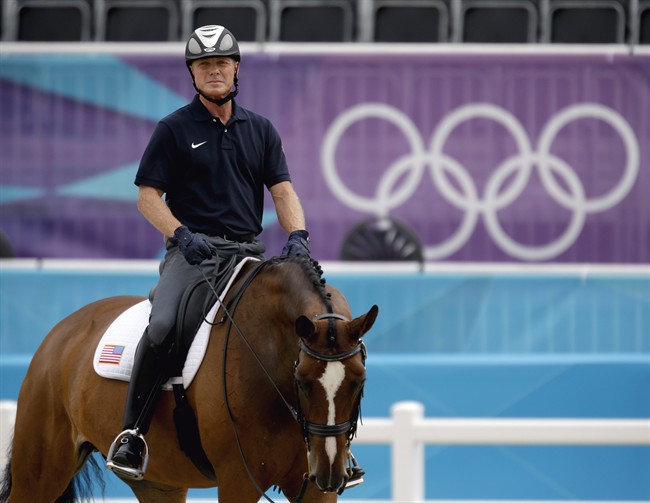 Jan Ebeling of the United States, rides his horse Rafalca during a training session for the equestrian dressage competition at the 2012 Summer Olympics, Wednesday, Aug. 1, 2012, in London. Rafalca is co-owned by Ann Romney, the wife of U.S. Republican presidential candidate Mitt Romney. (AP Photo/David Goldman)