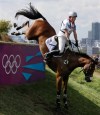 Zara Phillips of Great Britain rides High Kingdom as she competes in the equestrian eventing cross-country phase at Greenwich Park, at the 2012 Summer Olympics, Monday, July 30, 2012, in London. (AP Photo/Ng Han Guan)