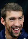 U.S. swimmer Michael Phelps smiles during a media day for Speedo sponsored athletes ahead of the 2012 Summer Olympics in London, Wednesday, July 25, 2012. (AP Photo/Lee Jin-man)