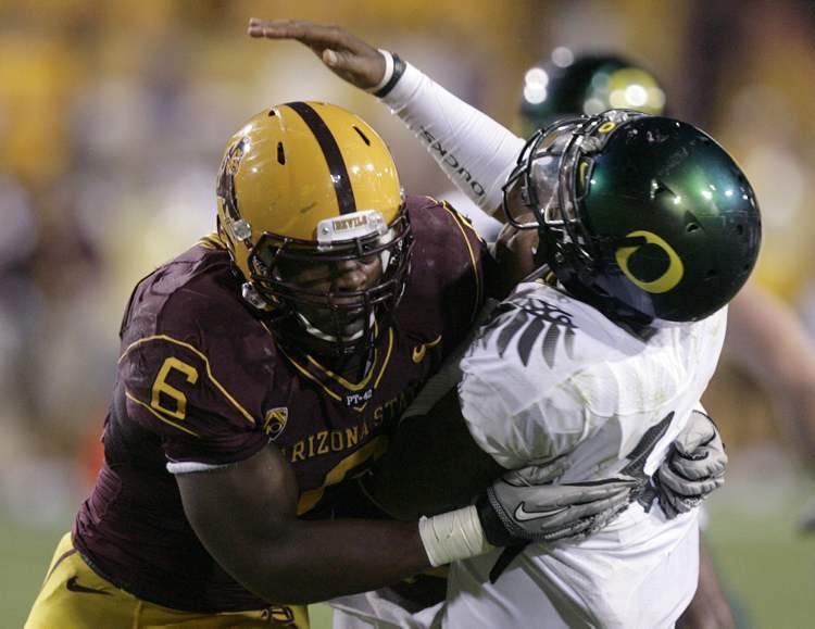 Paul Connors / The Associated Press Archives
Former Arizona State linebacker Shelly Lyons, left, has been signed by the Winnipeg Blue Bombers.