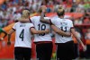 Germany's Leonie Maier, left to right, Alexandra Popp, and Anja Mittag celebrate a goal as they take on Cote d'Ivoire's during FIFA Women's World Cup soccer action in Ottawa on Sunday, June 7, 2015. THE CANADIAN PRESS/Sean Kilpatrick