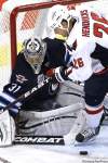 JOHN WOODS / WINNIPEG FREE PRESS
Ondrej Pavelec stones Washington Capitals forward Matt Hendricks in the Jets' 4-1 victory Thursday, just one more indication he's not giving up the starting role without a fight.