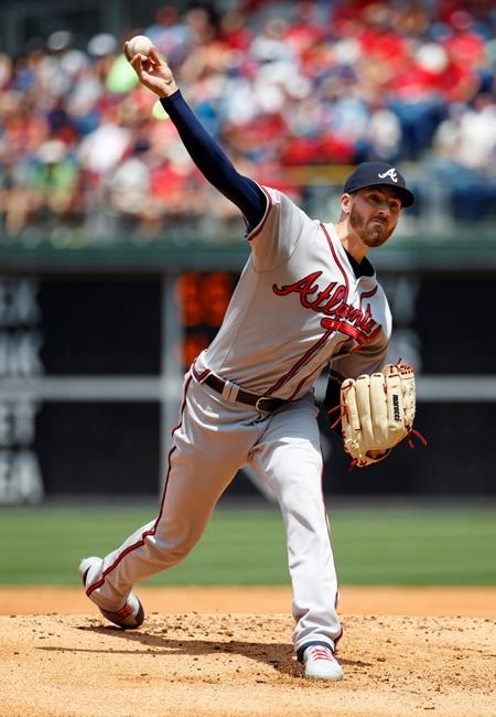 Atlanta Braves starting pitcher Kevin Gausman throws a pitch during the first inning of a baseball game against the Philadelphia Phillies, Sunday, July 28, 2019, in Philadelphia. (AP Photo/Chris Szagola)