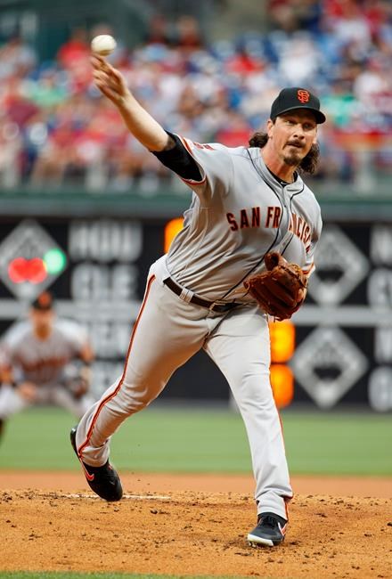 San Francisco Giants starting pitcher Jeff Samardzija throws a pitch during the first inning of a baseball game against the Philadelphia Phillies, Wednesday, July 31, 2019, in Philadelphia. (AP Photo/Chris Szagola)